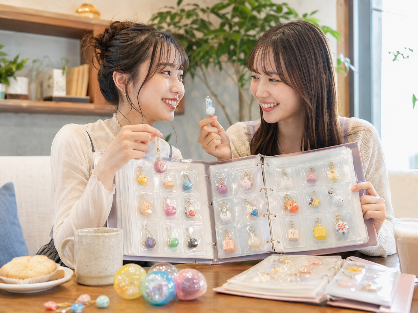 ガチャ帳を見せ合って交換するイメージ